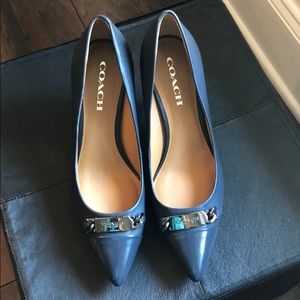 New Navy Coach pumps.